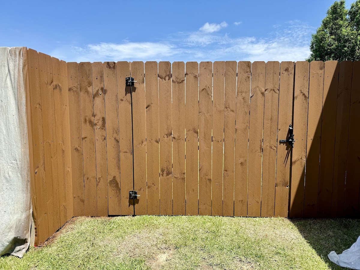 Stained wooden privacy fence